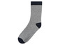 Graue Socke mit blauen Details.