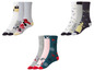 Drei Paar Disney-Socken mit Weihnachtsmotiv.