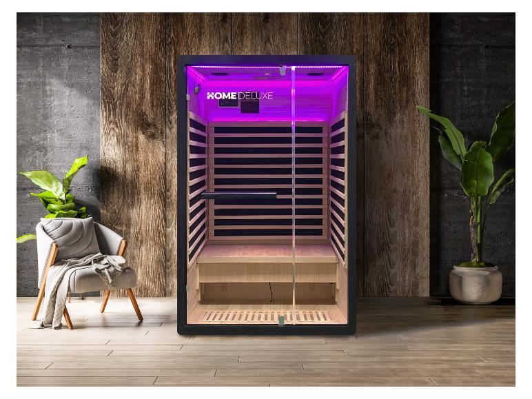 HOME DELUXE Infrarotsauna mit violetter LED-Beleuchtung in einem Raum mit Holz- und Betonwänden.