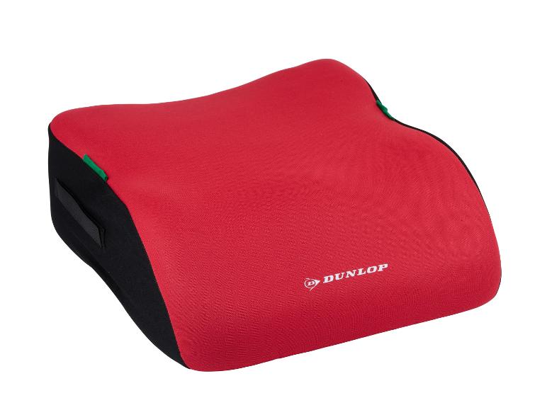 Rotes Lendenkissen mit schwarzen Seiten und grünen Akzenten.
