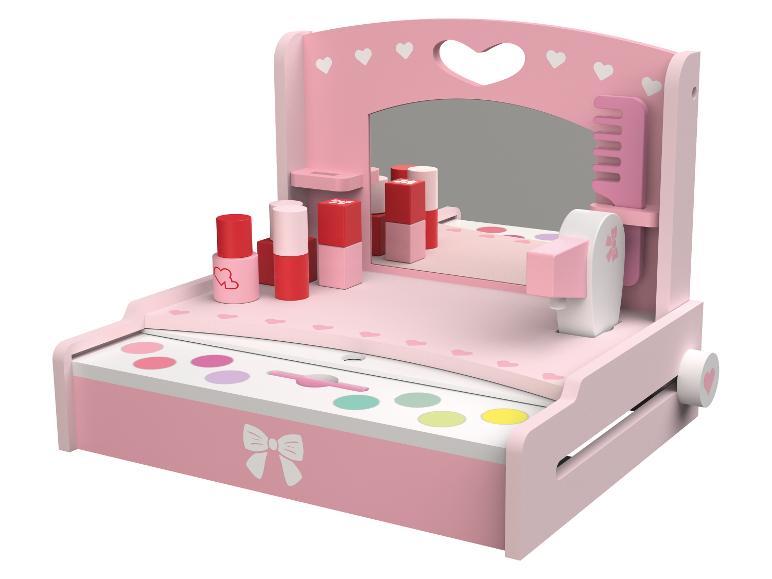 Rosa Kinderschminktisch mit Spiegel, Kosmetik und Zubehör.