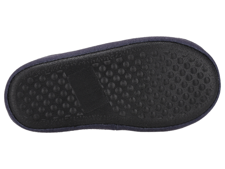 Sohlen von dunklen Stoffpantoffeln mit geprägten Punkten.