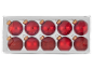 Rote Weihnachtskugeln mit glänzender und glitzernder Oberfläche in transparenter Box.