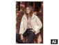 Frau in beiger ESMARA® Premium Damen-Thermosteppjacke, rosa T-Shirt und schwarzer Hose. [KI-generiertes Bild]