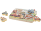 Holzpuzzle mit Fahrzeugmotiven und Stadtlandschaft.