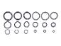 Schwarze O-Ringe in verschiedenen Größen, in Reihen angeordnet.