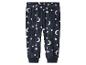 Dunkelblaue Pyjamahose mit weißen Sternen und Monden.