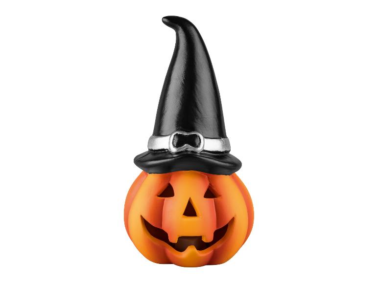 Dekorativer Halloween-Kürbis mit schwarzem Hexenhut.