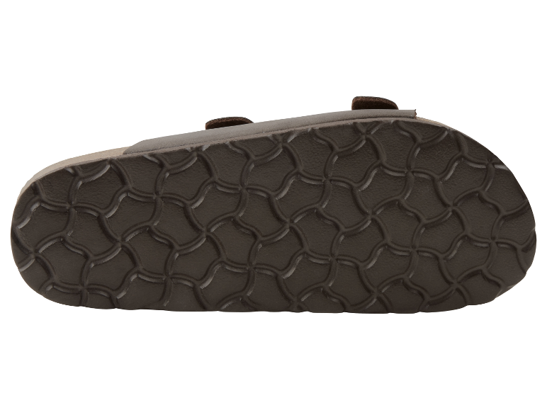 Sohle von braunen Ledersandalen mit Prägemuster.