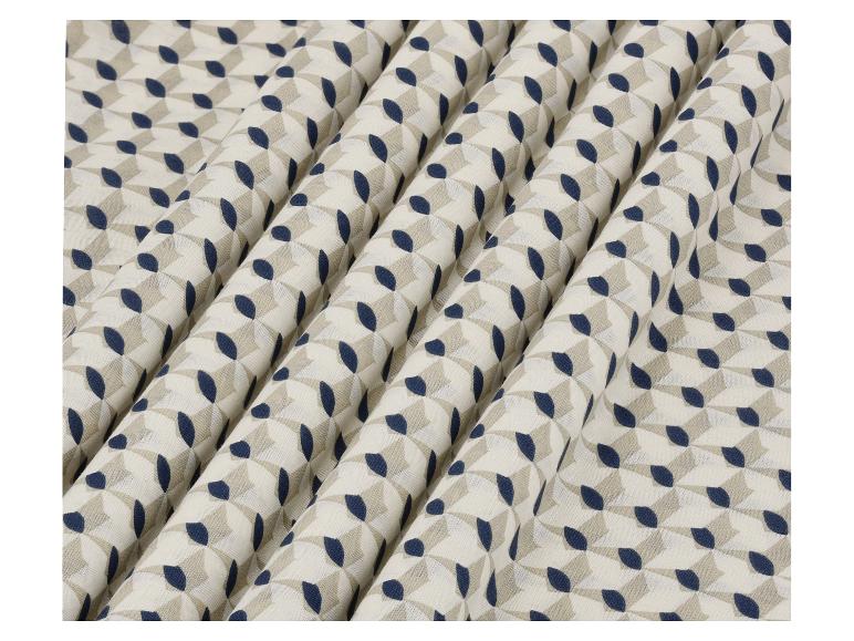 Stoff mit geometrischem Muster in Creme, Marineblau und Beige.