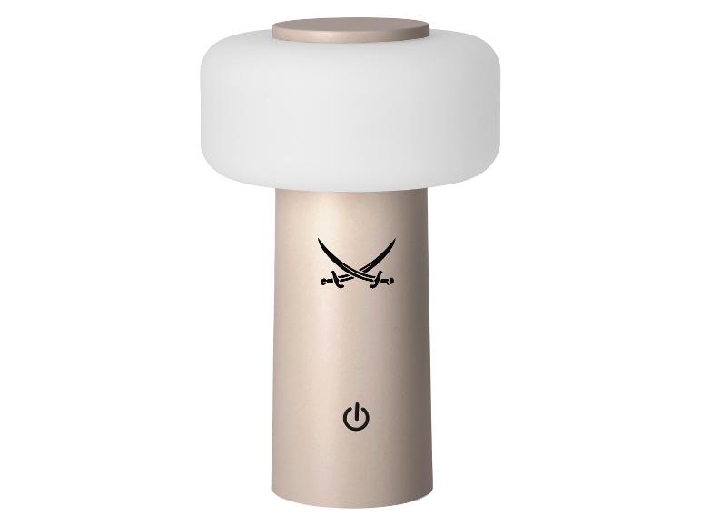 Beige tragbare Tischlampe mit weißem Diffusor, gekreuzten Schwertern und Ein-/Ausschalter.