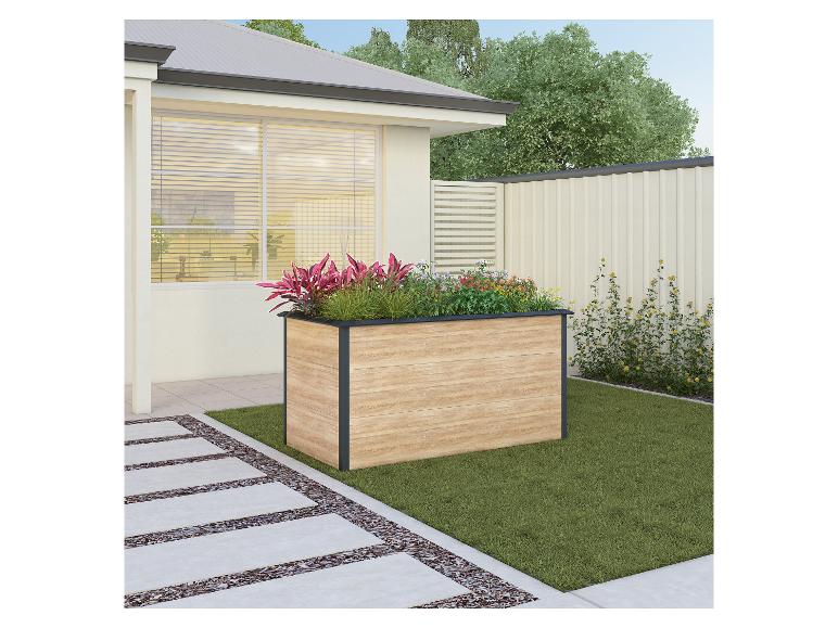 Holz-Hochbeet mit bunten Pflanzen in einem modernen Garten.