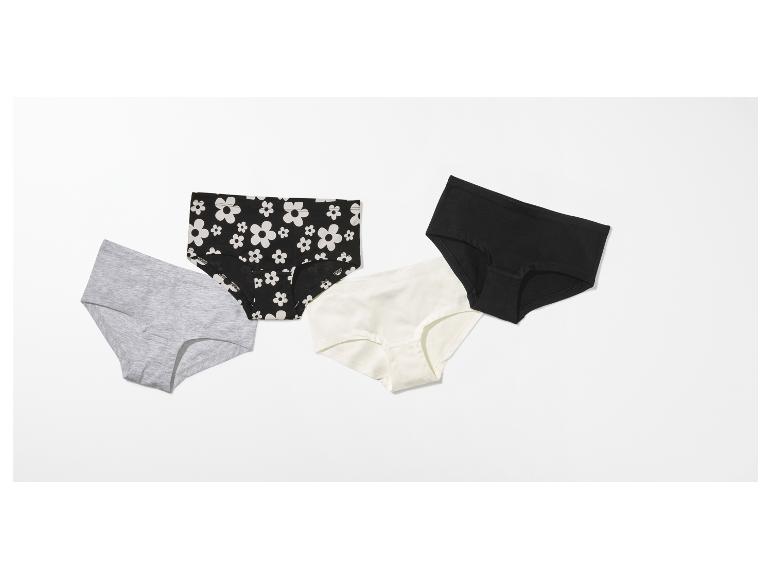 Vier Damenunterhosen: eine graue, eine schwarze mit weißen Blumen, eine cremefarbene und eine schwarze.