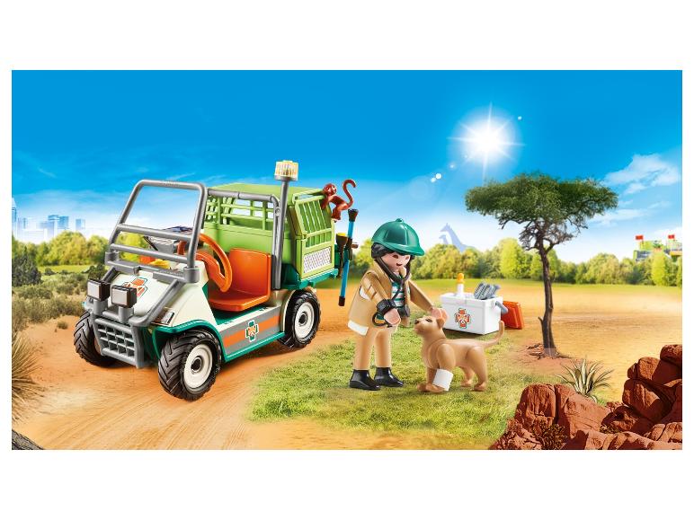 Playmobil Tierarztfahrzeug mit Figur, Hund und Affe in einer Safari-Umgebung.