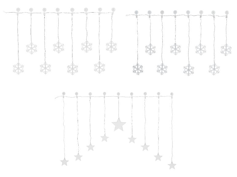 Lichterketten mit weißen Schneeflocken und Sternen, perfekt für Weihnachtsdekorationen.