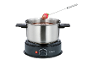 Schokoladenfondue-Topf mit Erdbeere auf einer Fonduegabel.