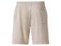 Rückansicht einer hellbeigen Herren-Shorts mit elastischem Bund und einer Gesäßtasche.