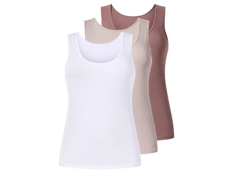 Drei Damen-Tanktops in Weiß, Beige und Braun, diagonal gestapelt.