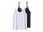 Zwei Camisole-Tops, ein weißes und ein schwarzes, beide mit Spitze.