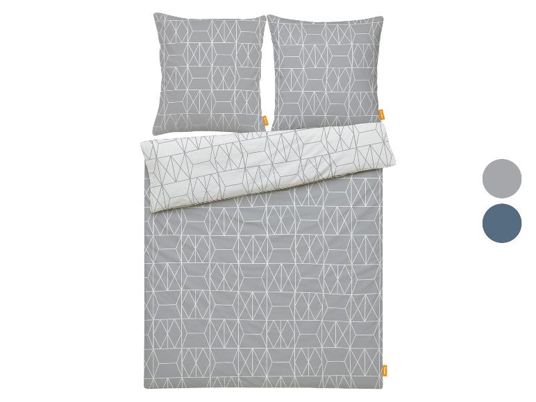 Graue Bettwäsche und Kissenbezüge mit geometrischem Muster, Wendeldesign.