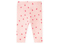 Rosa Leggings mit Herzchenmuster.
