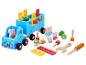 Peppa Pig Holzspielzeugset mit LKW, Werkzeugen und Figuren.