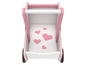 Ein rosa Spielzeug-Kinderwagen aus Holz mit Herzen.