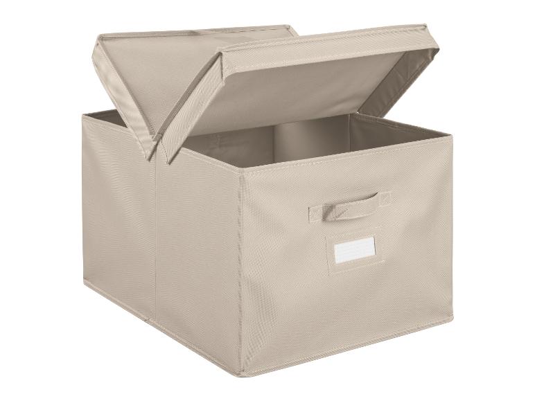 Eine beige Aufbewahrungsbox mit Deckel, offen zum Verstauen.