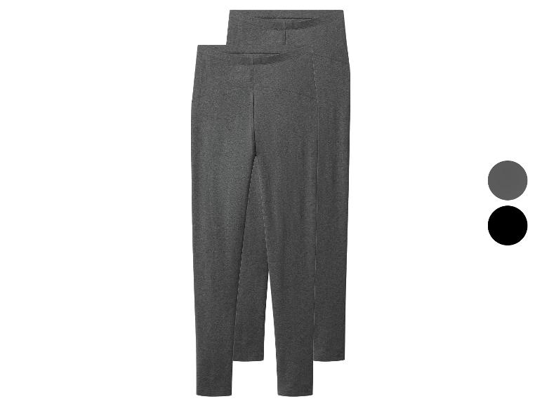 Zwei Paare dunkelgrauer und schwarzer Leggings, hintereinander positioniert.