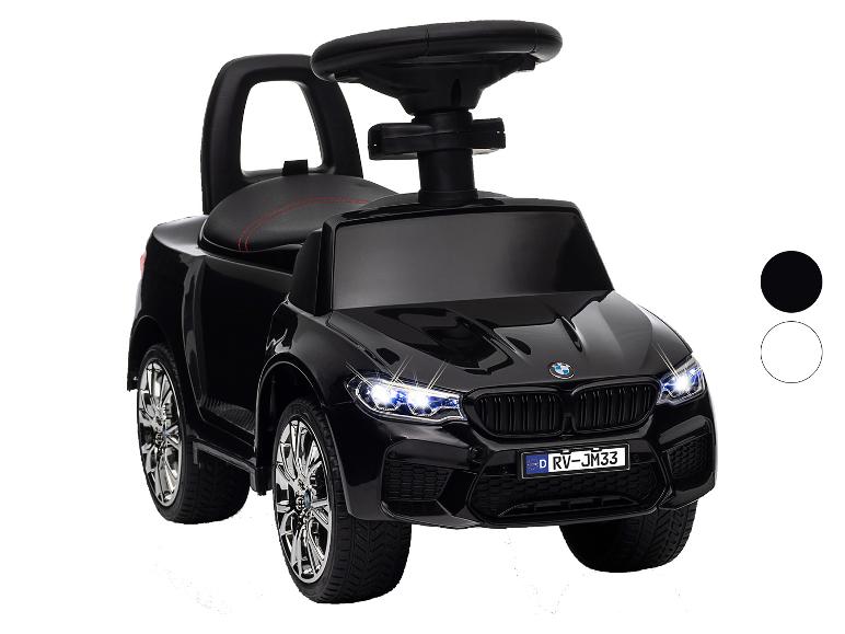 Schwarzes Plastik-Kinderfahrzeug im BMW-Stil mit Lenkrad.