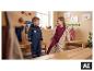 Kleinkinder in gefütterten LUPILU® Matsch- und Buddeloveralls in einer Garderobe. [KI-generiertes Bild]