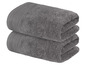 Zwei graue Handtücher, gefaltet