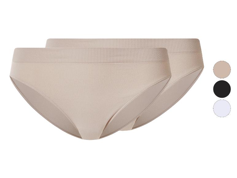 Zwei beige gerippte Slips mit Farboptionen in Beige, Schwarz und Weiß.