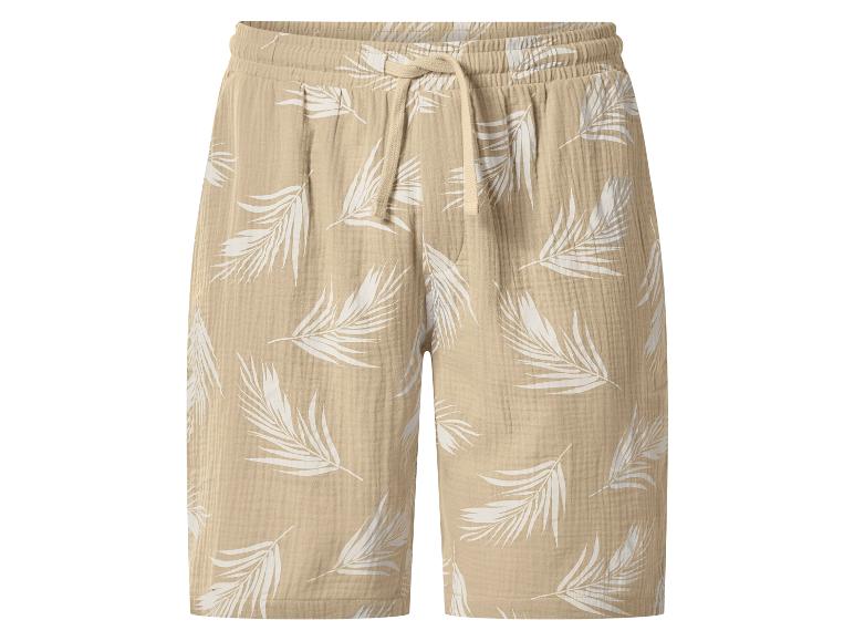 Beige Musselin-Shorts mit weißem Blattmuster und Kordelzug.