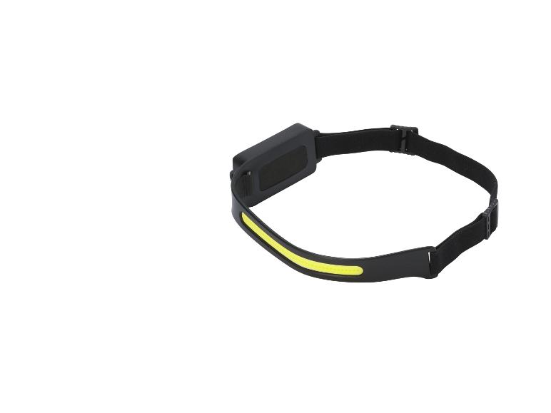 Schwarze LED-Stirnlampe mit gelbem Lichtstreifen, Seitenansicht