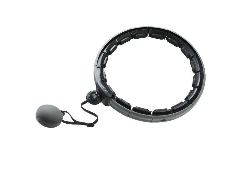 Ein grauer Hula-Hoop-Reifen mit digitalem Zähler und angebrachtem kugelförmigem Gewicht.