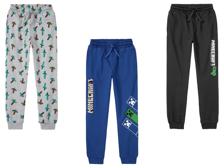 Drei Minecraft Jogginghosen: grau mit Spitzhacken, blau mit Logo und schwarz mit Creeper.