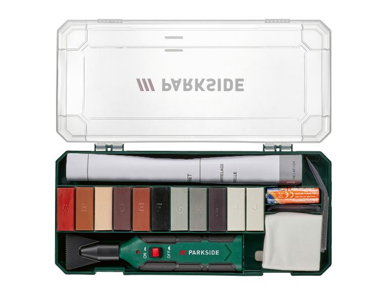 PARKSIDE Bodenreparaturset mit Wachsstiften, Werkzeug und Batterien in offener Box.