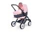 Ein rosa Maxi-Cosi Kinderwagen mit einer Babywanne.