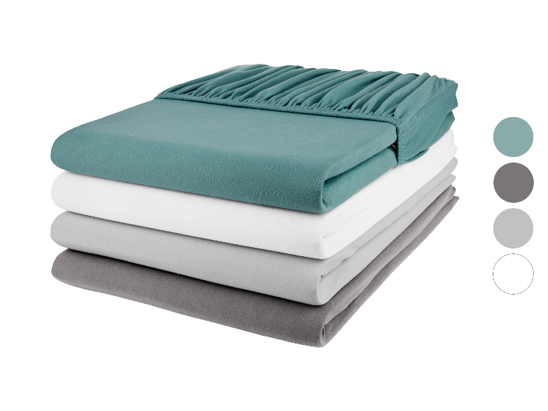 Baumwoll-Bettwäsche in vier neutralen Farben.