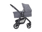 Ein Graco Kinderwagen mit einem grauen, gestreiften Schlafkorb.