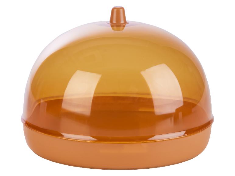 Eine orangefarbene Plastikdose mit transparentem Deckel.