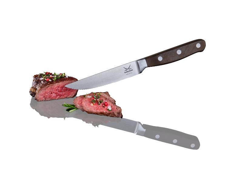 Steak, Sansibar Messer und Rosmarin.
