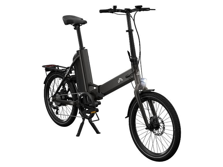 Dunkelgraues Klapp-E-Bike mit Gepäckträger und Vorderlicht.