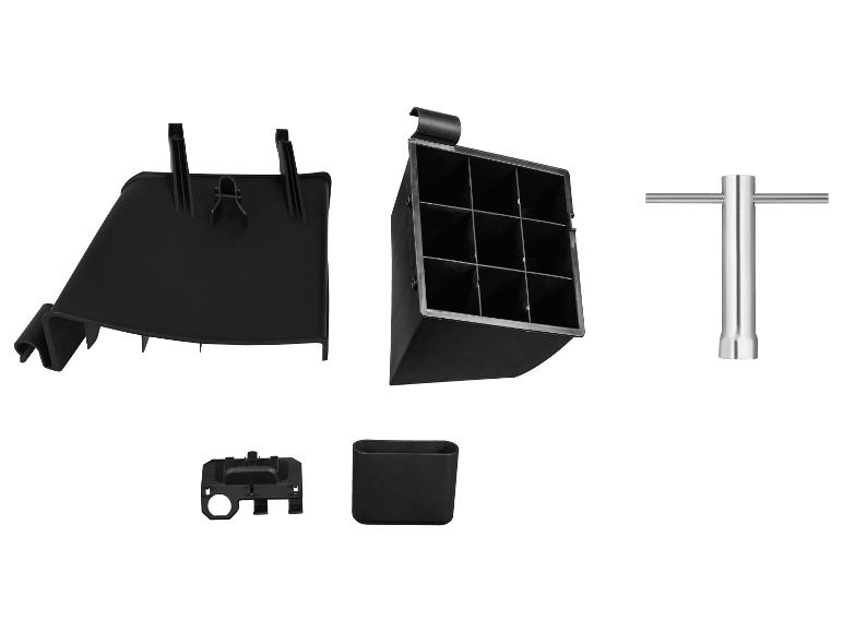 Schwarze Kunststoffteile und ein Metallschlüssel auf weißem Hintergrund.