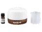 Aromatherapie-Diffusor mit ätherischem Öl und Messbecher.