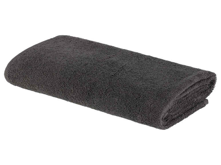 Ein dunkelgraues Handtuch auf weißem Hintergrund gefaltet.