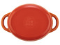 Eine orangefarbene Livarno Home Bratpfanne mit zwei Griffen.