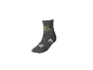 Graue Socke mit grünem Triceratops und Dinosaurier-Fußabdruckmustern.