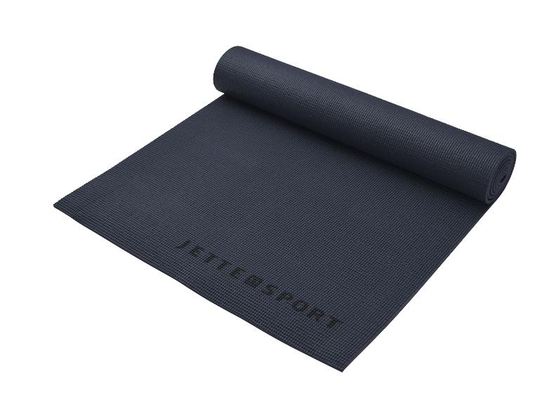 Eine dunkelblaue Yogamatte von Jettsport, aufgerollt.